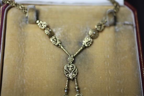 An early 20th century French 18ct gold, guilloche enamel and seed pearl sautoir pendant watch, retailed by Cartier.